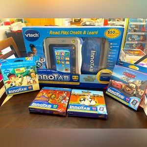 Brand new Vtech learning app tablet with case and 4 games.